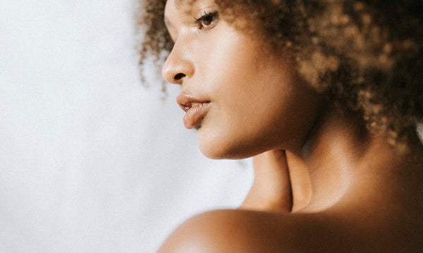 Woman touching hair 